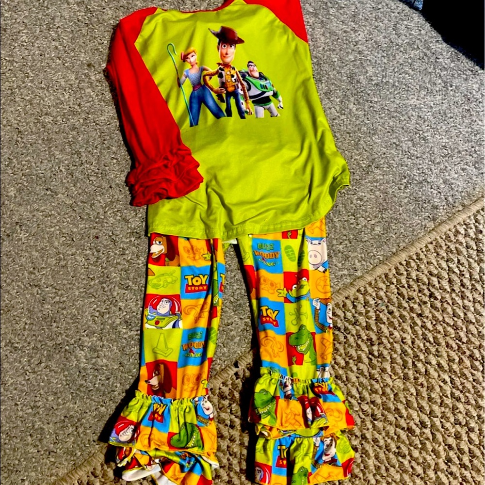 5/6T boutique ruffle bottom pant set with toy story.